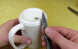 Sharpening Pocket Knife with a Coffee Mug